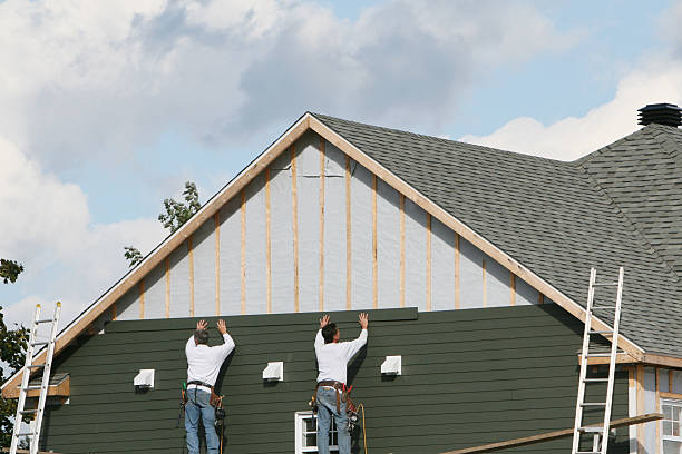Professional Siding technician working in Columbus, TX